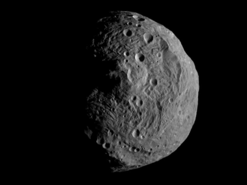 [Asteroid Vesta � image obtained by NASA's Dawn spacecraft (http://www.nasa.gov/mission_pages/dawn/main/index.html). Vesta is one of the largest asteroids in the solar system with a diameter of about 328 miles (525 km). Image credit: NASA/JPL-Caltech/UCLA/MPS/DLR/IDA.  From http://www.nasa.gov/mission_pages/dawn/multimedia/pia14313.html]